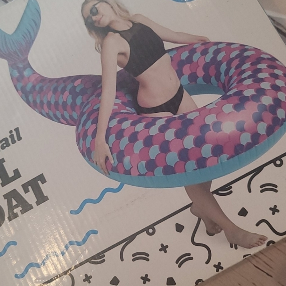 NEW. NEVER USED. Large mermaid tail float